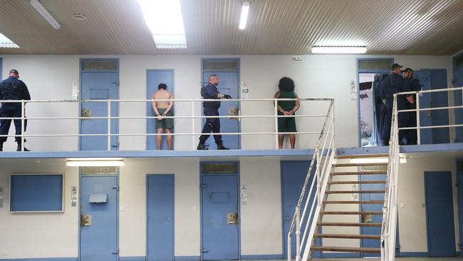 Corrective Services officers raid cells at Silverwater Jail looking for contraband. Picture: Richard Dobson