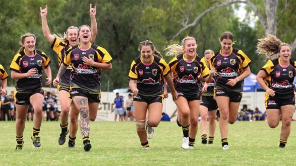 The Falcons celebrate after winning the final. Picture: Amanda Pearce/QRL