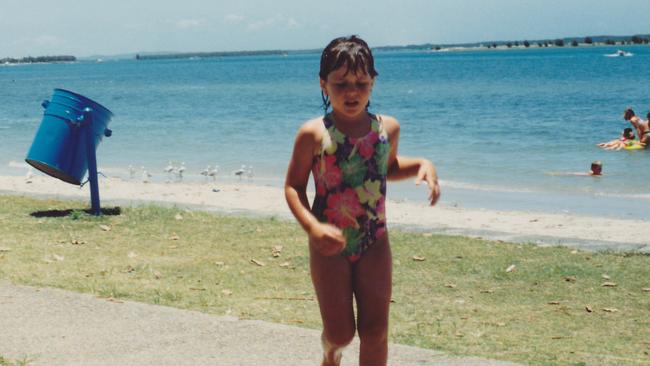 A young Alicia at the beach. Picture: Supplied.