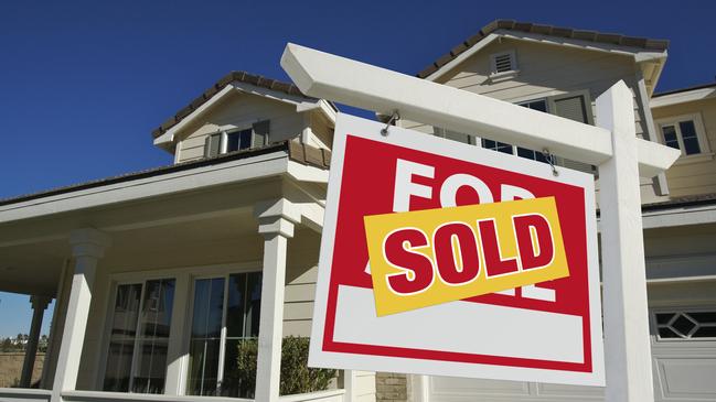 Sold Home For Sale Sign in Front of New House