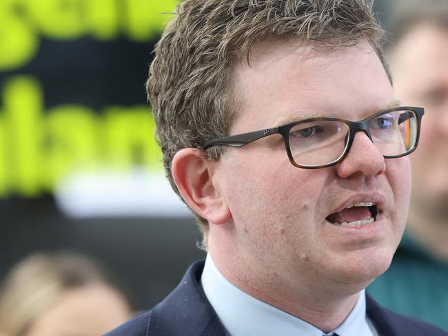 ADELAIDE, AUSTRALIA - NewsWire Photos November 4 2022: South Australian Health Minister Chris Picton during a media brief at the Fulham gardens Ambulance Station in Adelaide. The Minister is announcing  the new ambulance rollout with extra crews. NCA NewsWire / David Mariuz