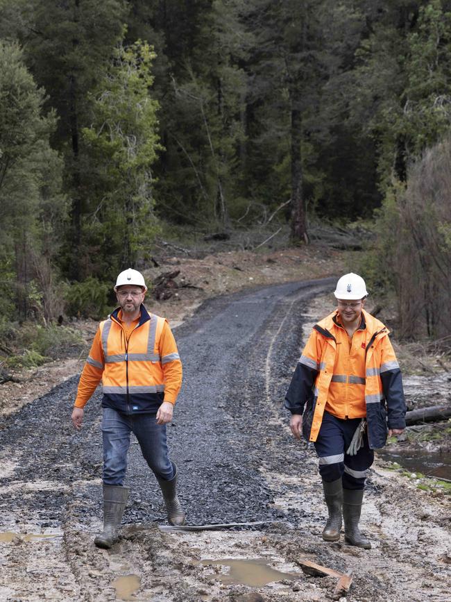 MMG Rosebery mine acting general manager Steve Scott and environmental officer Adam Pandleis at the point where upgrading work on the fire break the company is upgrading to provide access to the site of a proposed tailings dam stopped due to protests. Picture: Grant Wells