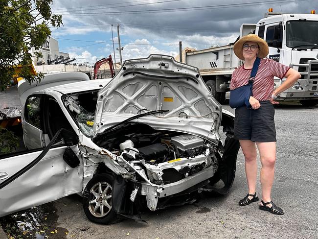 Amy MacMahon with her smashed up car post accident.
