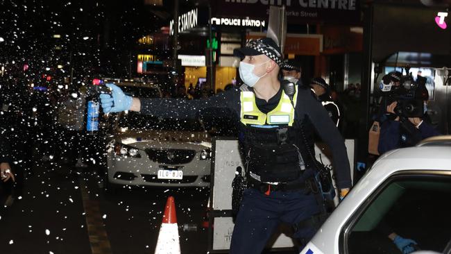 Police pepper spray the crowds. Picture: MatrixNews