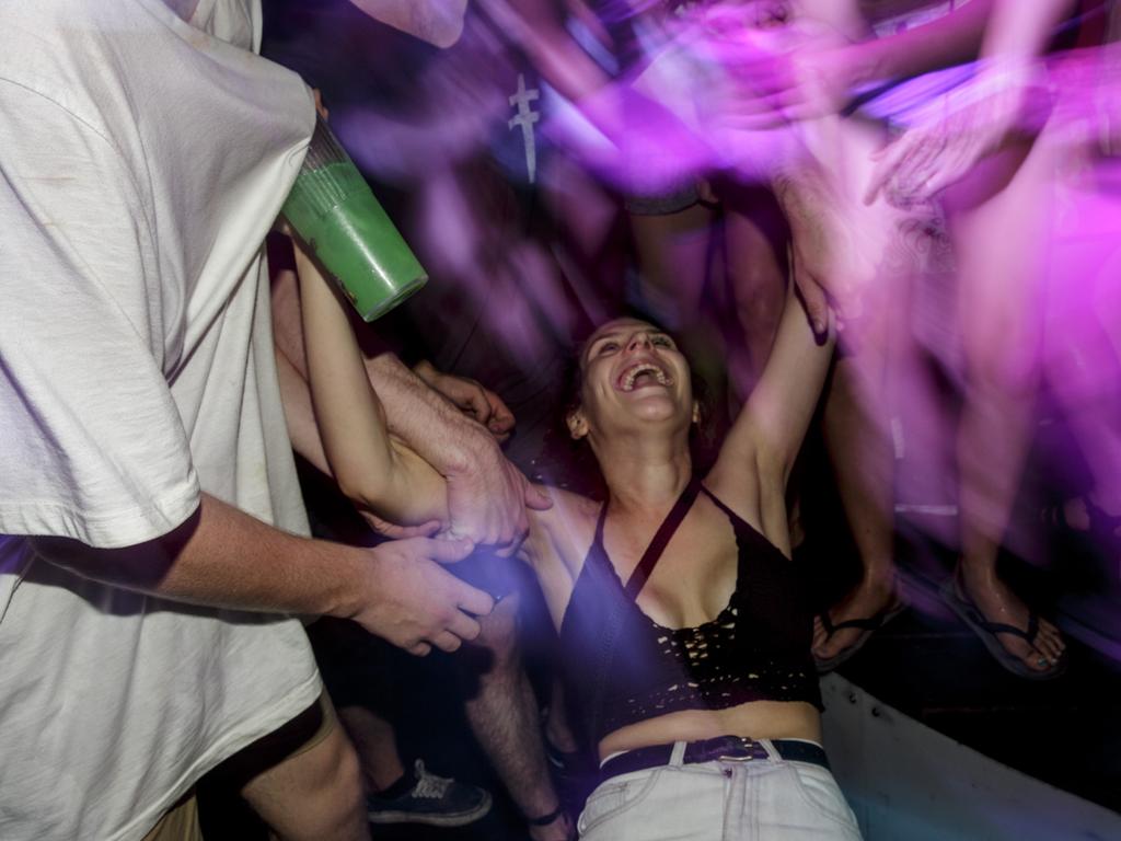 A girl dances at a party in a nightclub during Australian ‘schoolies’ celebrations in Kuta, Bali, Indonesia. This year around 6,000 students will travel to Bali to celebrate ‘Schoolies Week’, which marks the end of the school year. Picture: Getty