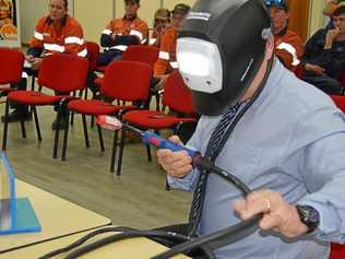 AUGMENTED REALITY: Garry Hargreaves from Tafe Queensland demonstrates fusion welding to attendees at the South West Tafe in Kingaroy. Picture: Matt Collins