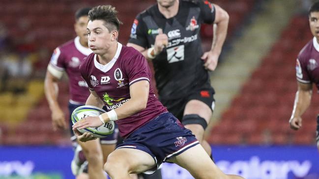 Jock Campbell of the Reds with the ball during the Round 4 Super Rugby match between the Queensland Reds and the Sunwolves at Suncorp Stadium in Brisbane, Saturday, February 22, 2020. (AAP Image/Glenn Hunt)