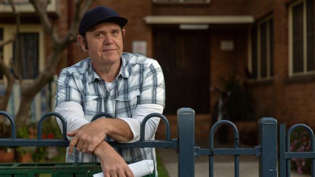 Singer-songwriter Perry Keyes, pictured outside his Department of Housing home at Waterloo, Sydney, NSW in 2019. As an artist, his sustained lyrical beat has been observational songs concerned with urban underclass life. Picture: Janine Young