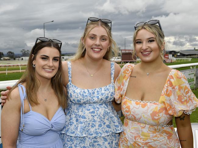 The Ladbrokes 2024 Moe Cup is held at Moe Horse Racing Club, Moe Victoria, Friday 18th October 2024. Racegoers Renee, Georgia and Georgia (OK) enjoying the races. Picture: Andrew Batsch