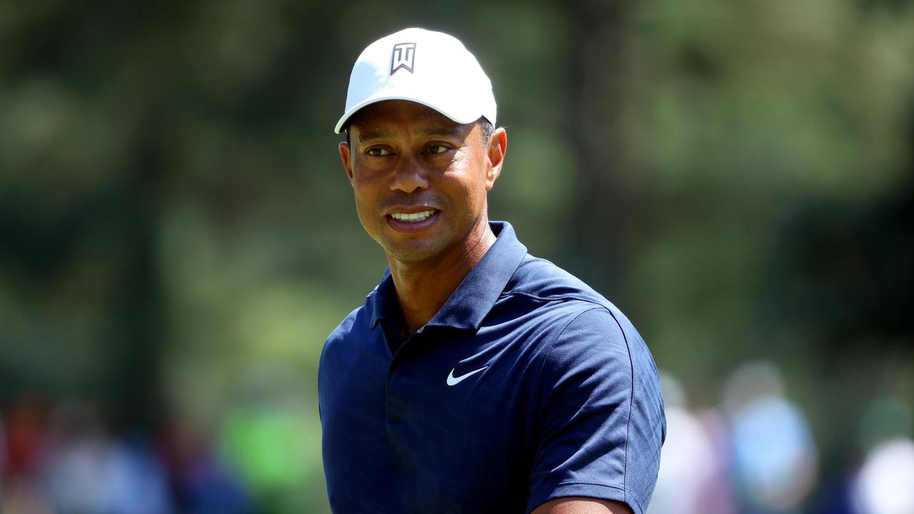 Tiger Woods walks on the first hole during a practice round. (Photo by Andrew Redington/Getty Images)