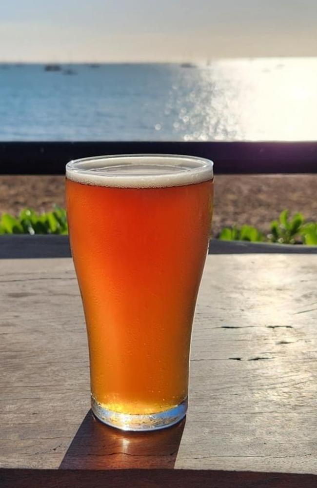 Darwin Brewing Co beer overlooking the ocean. Picture: Kate Dinning