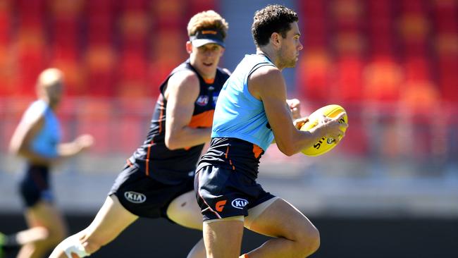 Josh Kelly in full flight at Giants training on Wednesday. Picture: Dan Himbrechts/AAP