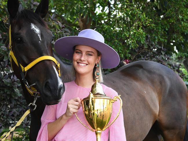 NT Turf Club young member Alex Ward and Garry Lefoe's horse Yulong Awesome are trotting mad at news tickets for the Darwin Cup Carnival are already on sale.  Picture Katrina Bridgeford.