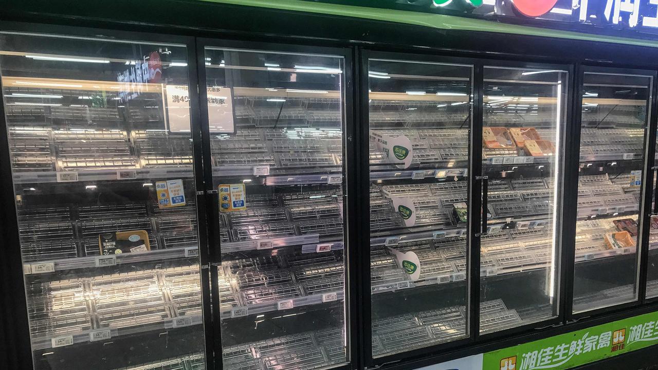 Residents in Wuhan have packed into shelves amid the new outbreak in China. Picture: STR / AFP) / China OUT.