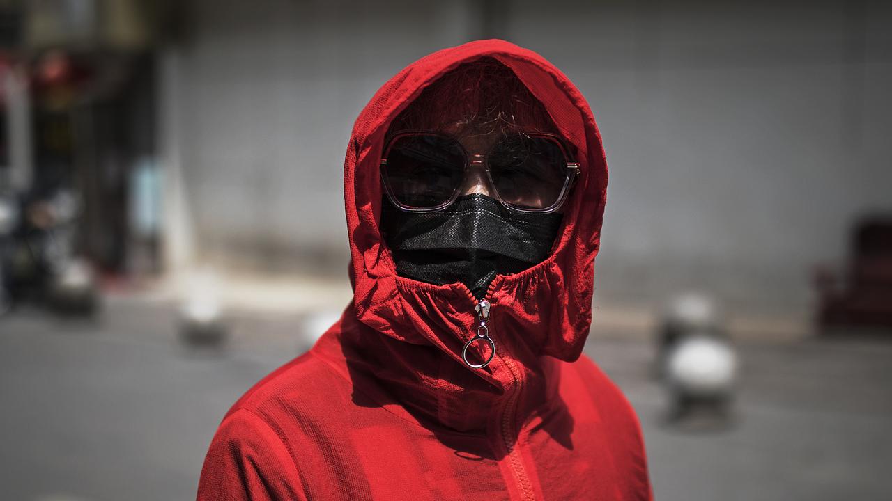 A woman wears a mask in Wuhan, Hubei Province, China. Picture: Getty Images