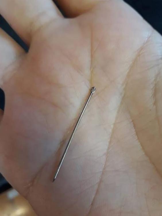 Angela Stevenson discovered this needle in her punnet of strawberries. Picture: Facebook