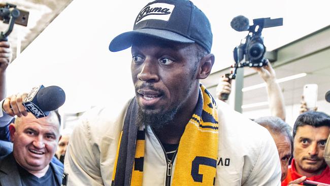 Usain Bolt arrives at Sydney airport on the weekend. Picture: Jenny Evans.