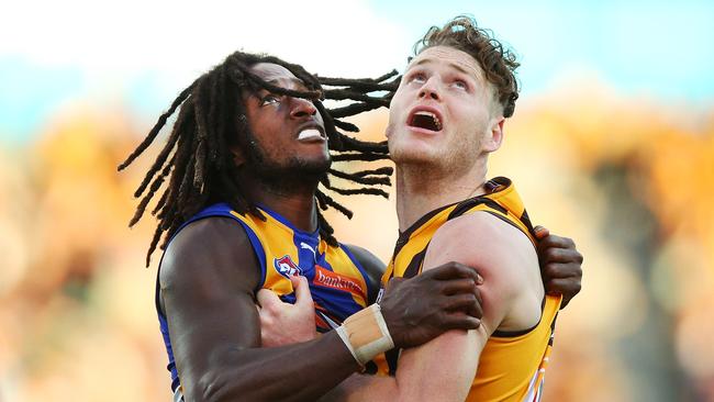 Luke Lowden in a ruck battle with West Coast star Nic Naitanui. Picture: Michael Dodge/Getty Images