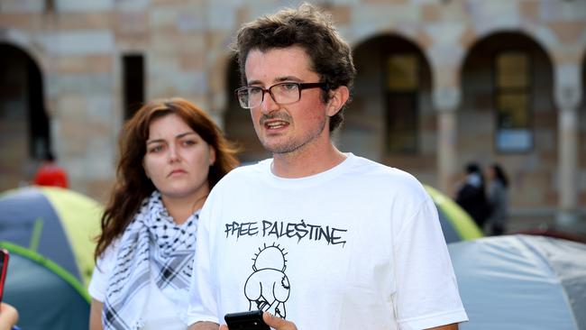 UQ Student Liam Parry condemnes the comments by two of their protesters at a press conference. Picture David Clark