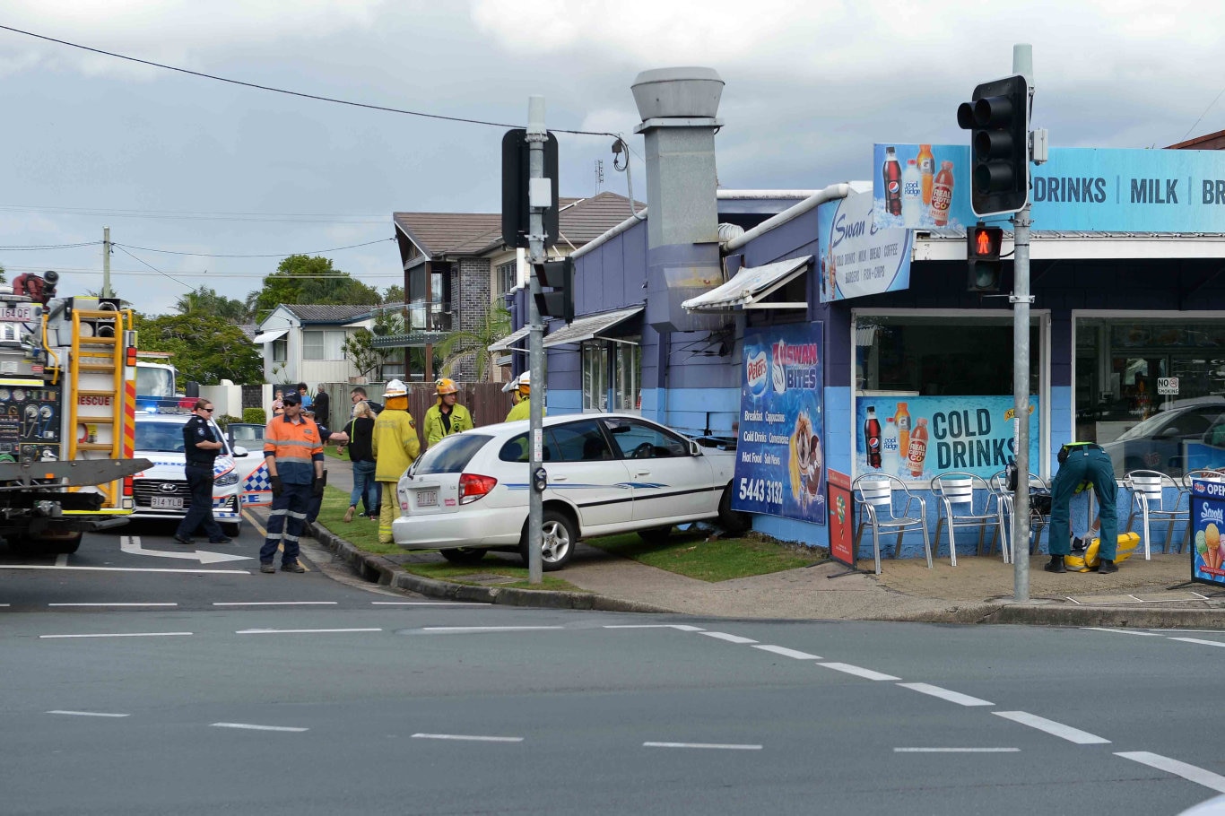 A woman in her 20s sufferd oil burns from a deep fryer after a car crashed into the Swan Bites Fish and Chip Shop at Maroochydore this morning.