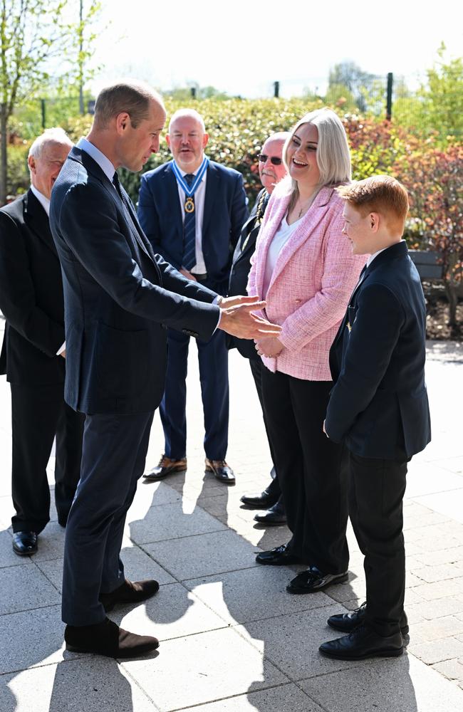 Prince William speaks with 12-year-old Freddie Hadley who made the initial invitation to visit the school. Picture: Getty Images