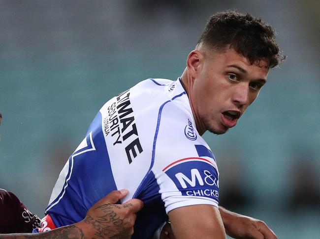 SYDNEY, AUSTRALIA - SEPTEMBER 11: Jake Averillo of the Bulldogs looks to pass the ball during the round 18 NRL match between the Canterbury Bulldogs and the Manly Sea Eagles at ANZ Stadium on September 11, 2020 in Sydney, Australia. (Photo by Cameron Spencer/Getty Images)