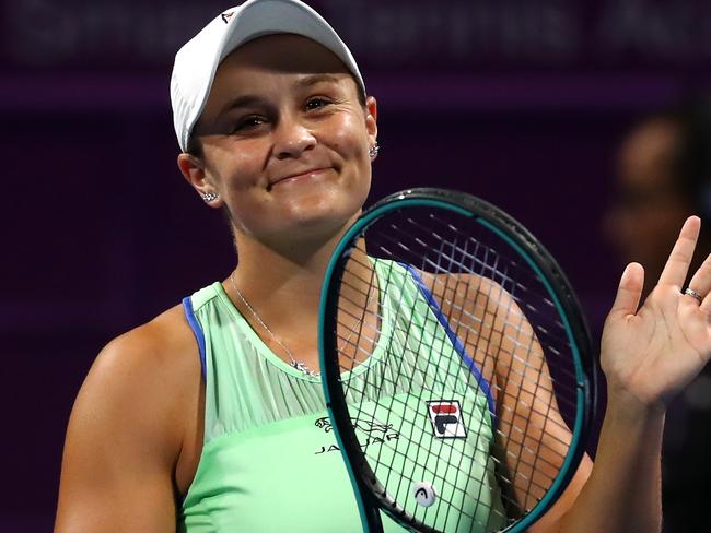 DOHA, QATAR - FEBRUARY 25: Ashleigh Barty of Australia celebrates winning match point against Laura Siegemund of Germany during Day 3 of the WTA Qatar Total Open 2020 at Khalifa International Tennis and Squash Complex on February 25, 2020 in Doha, Qatar. (Photo by Dean Mouhtaropoulos/Getty Images)