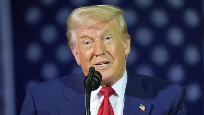 President Donald Trump speaks to members of the Michigan National Guard at Selfridge Air National Guard Base. Picture: AP Photo/Alex Brandon)