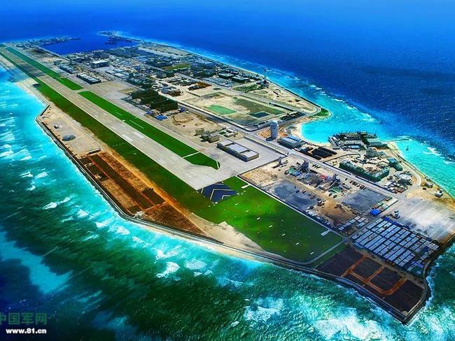 The military-grade airfield and extensive barracks, warehouses and support facilities of Fiery Cross reef are evident in this image recently released by Chinese state media.