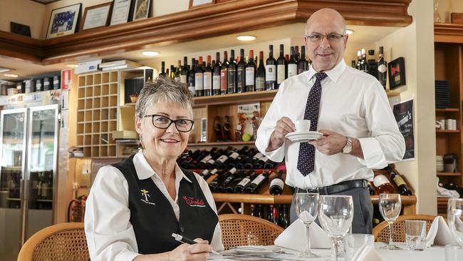 Front of house staff Angela Stebbing with La Tombola Italian restaurant owner Tony De Ieso in 2019, before the pandemic. Photo: Mike Burton/ The Advertiser.