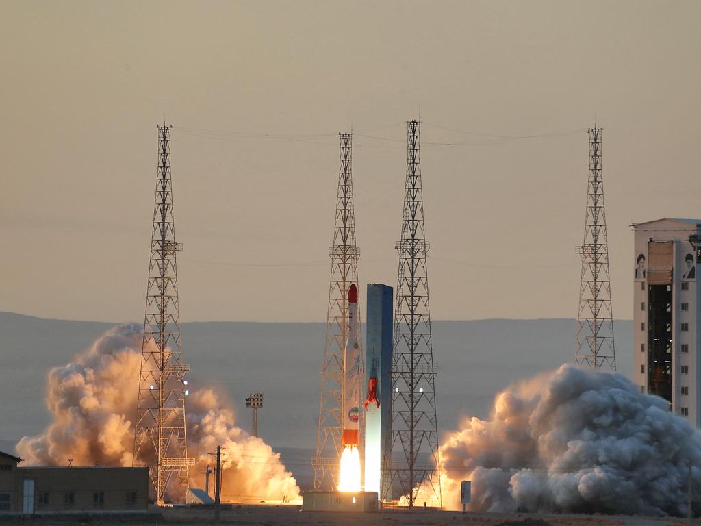 Iran's Defence Ministry photo shows a Simorgh (Phoenix) satellite rocket lifting off during its launch at an undisclosed location in Iran. Picture: AFP