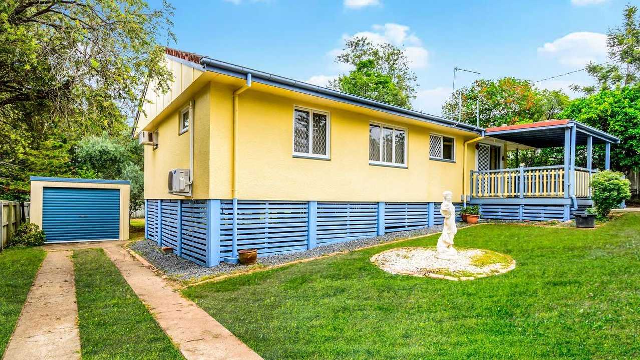 A charming yellow home on Stuart St.