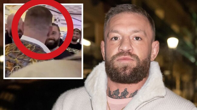 Conor McGregor spits in fan's face.