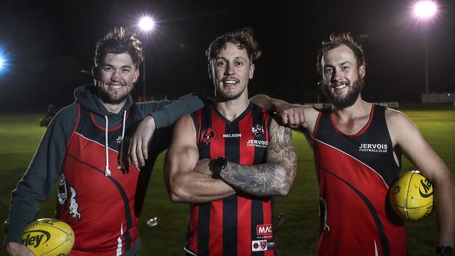 Jervois Football Club coach Taite Silverlock (centre) with Josh Woodall (captain) and Alex Bockman. Picture: Sarah Reed.