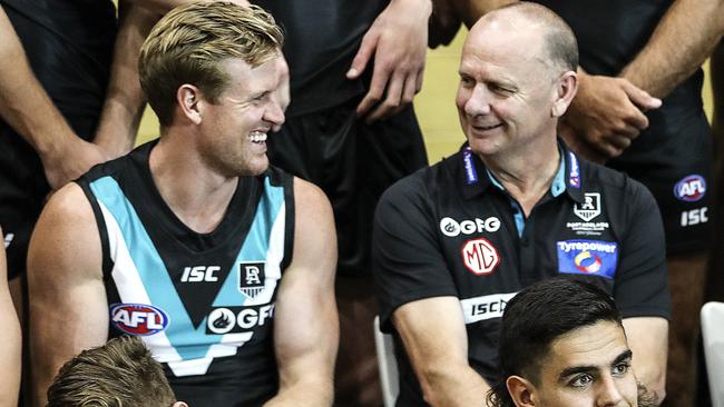 Port Adelaide captain Tom Jonas with coach Ken Hinkley. Picture: Sarah Reed