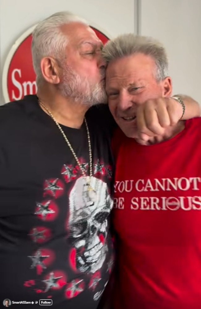 Mick Gatto kisses Sam Newman. Photo: YouTube.