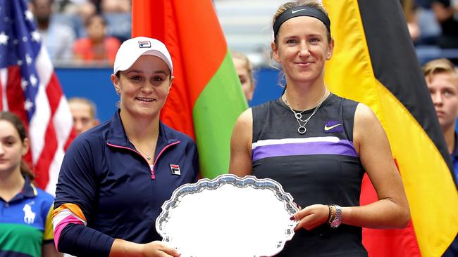 Ash Barty, left and Victoria Azarenka with their runners-up trophy after the final of the US Open women’s doubles final. Picture: Getty Images