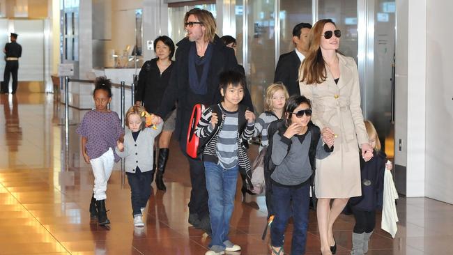 Brad Pitt, Angelina Jolie and their six children Maddox, Pax, Zahara, Shiloh, Knox, and Vivienne arrive in Tokyo, Japan in November 2008.