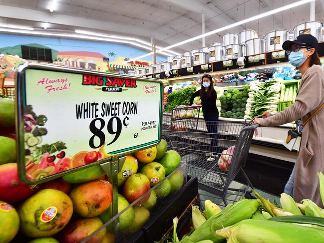 Grocery shopping in Rosemead, California on April 21, 2022. - US inflation reached a four-decade high of 8.5% in March and prices are expected to continue to rise for staples like bread, meat, and milk as farmers faces shortages of fuel, fertilizer, and materials as the Russia-Ukraine conflict continues. (Photo by Frederic J. BROWN / AFP)