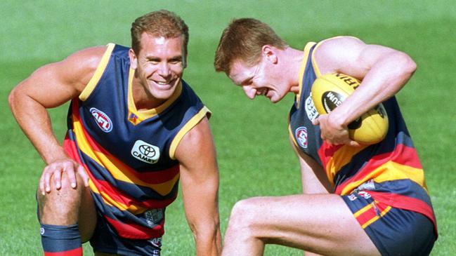 Wayne Carey, left, with Ben Hart at Crows training in 2003.