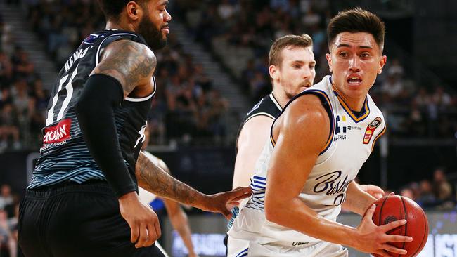 MELBOURNE, AUSTRALIA - DECEMBER 10: Reuben Te Rangi of the Bullets works hard against DJ Kennedy of United  during the round eight NBL match between Melbourne United and the Brisbane Bullets at Hisense Arena on December 10, 2018 in Melbourne, Australia. (Photo by Michael Dodge/Getty Images)