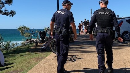 Queensland Police picture on patrol at Burleigh headlands on the Gold Coast. Picture: Greg Stolz