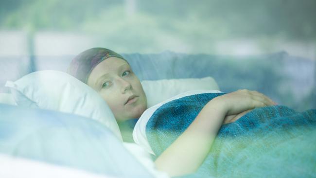 RendezView. Young woman in bed suffering from cancer. (Pic: iStock)