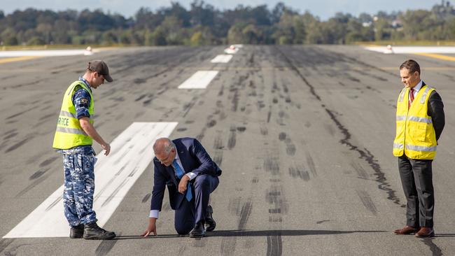 Mr Morrison on a visit to RAAF base Amberley to announce the Government will deliver major airfield works across four sites at RAAF Bases Amberley, Pearce, Richmond, and HMAS Albatross that will maintain critical airfield infrastructure. Picture: Jason Edwards