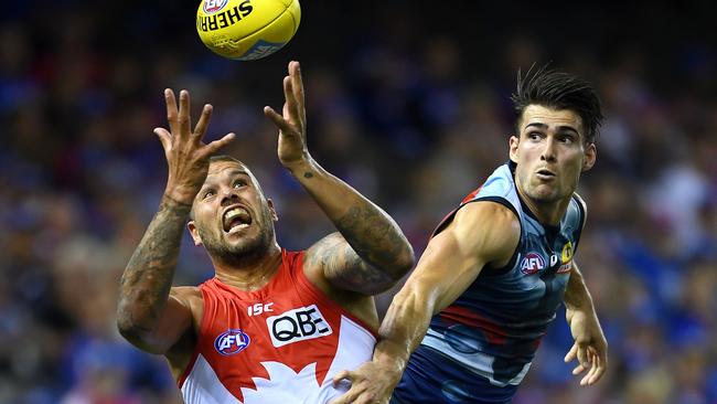 Lance Franklin marks in front of Easton Wood but the Swans star had a quiet night. Picture: Getty Images