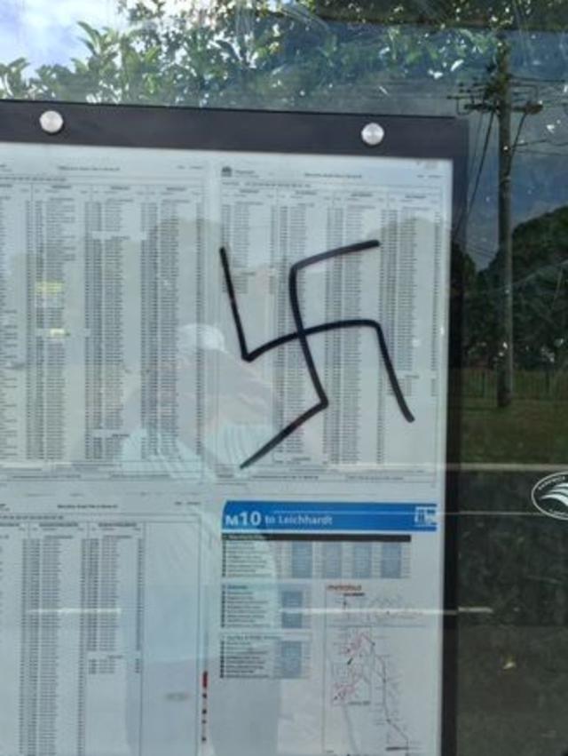 Swastika graffiti at an Anzac Pde bus stop. Picture: Facebook