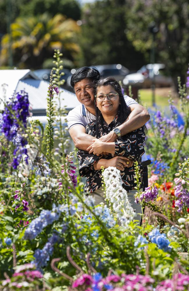 Brisbane visitors Prabhat (left) and Prathna Baagdas in Queens Park for the last day of the Carnival of Flowers, Monday, October 7, 2024. Picture: Kevin Farmer