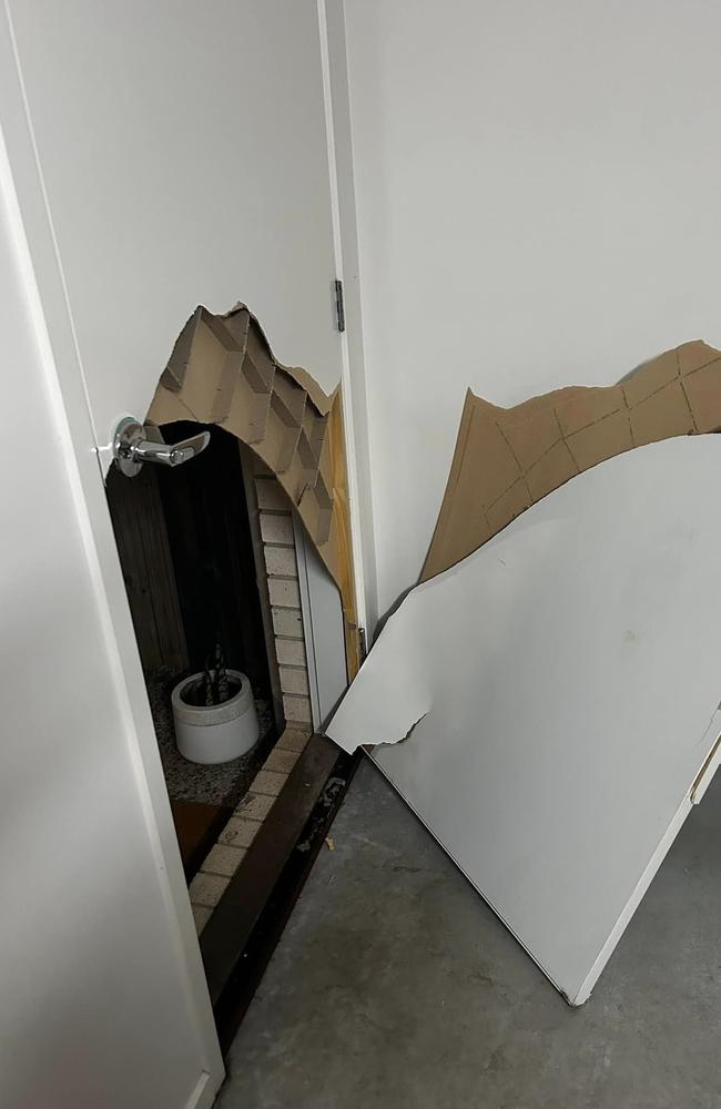 The remnants of the hollow core door that was used as an exterior door at the Redbank Plains home. Picture: Supplied