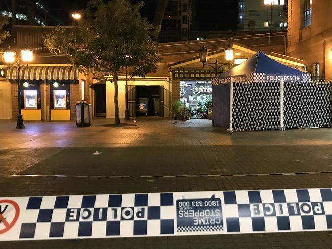 A police tent has been erected at the scene where a man was shot following reports of an armed robbery. Picture: AAP Image/Perry Duffin