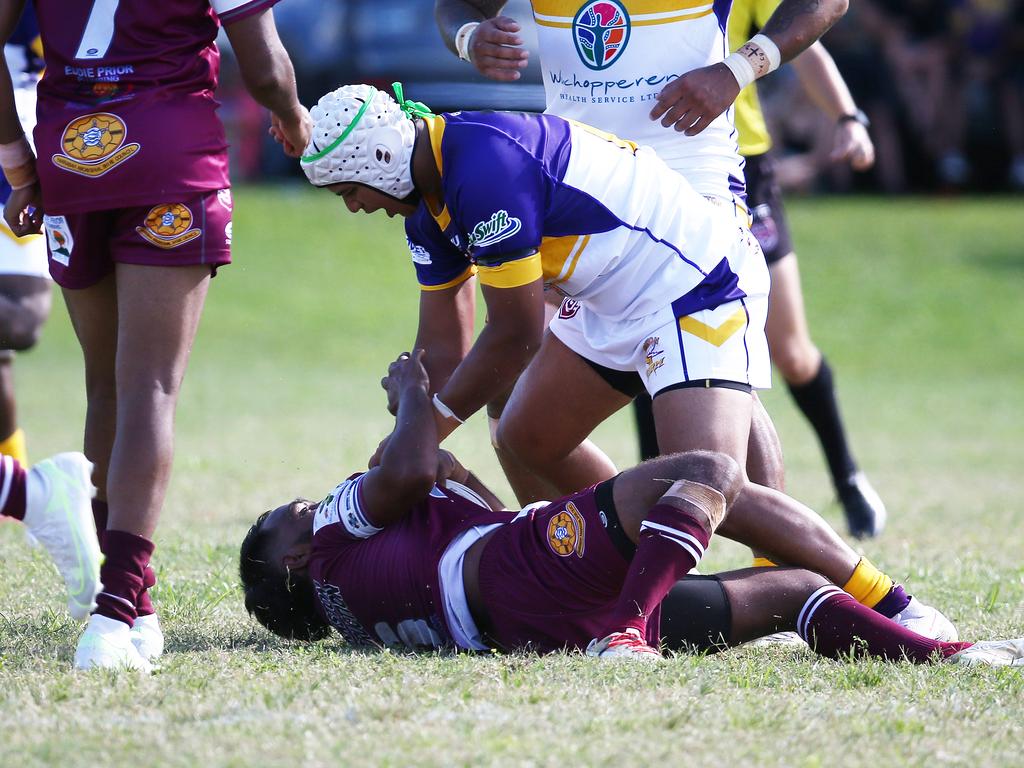 Edmonton's Tyrees Crathern stands over Yarrabah's Coleridge Pabah after he threw a punch at his team mate in the Cairns and District Rugby League (CDRL) match between, the Edmonton Storm and the Yarrabah Seahawks, held at Peterson Park, Edmonton. Picture: Brendan Radke
